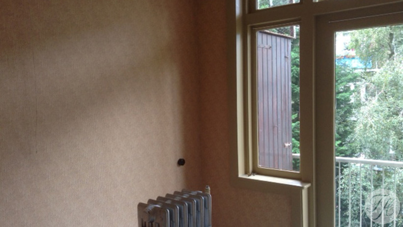 Betengelde en behangen wanden in ouderlijk woonhuis van Anne Frank in Amsterdam